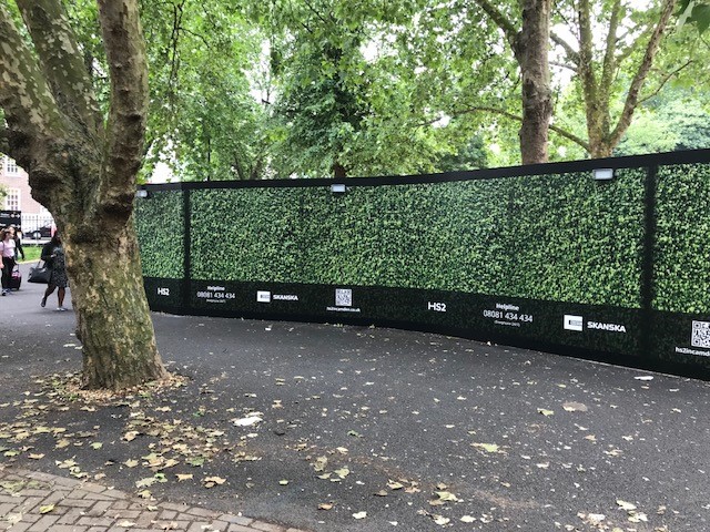 Hoardings at Euston Square Garden