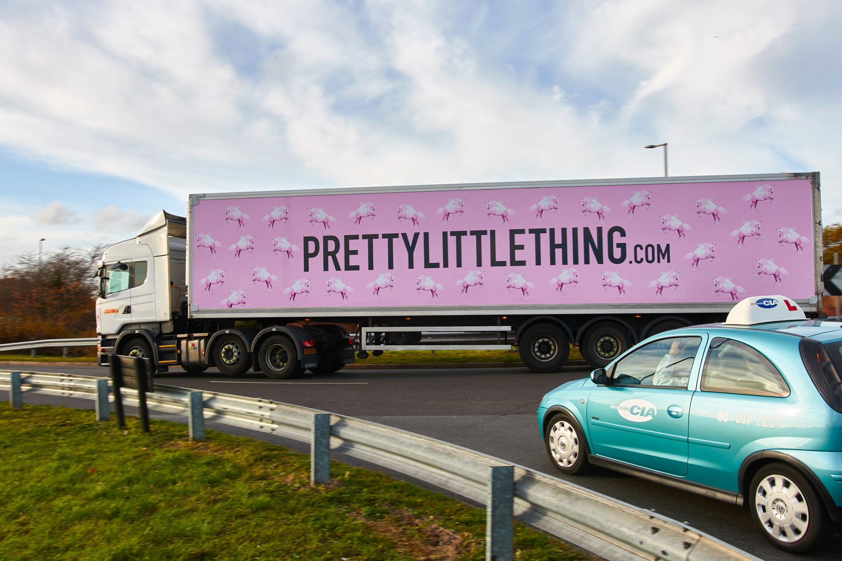 Pretty Little Thing truck on the road