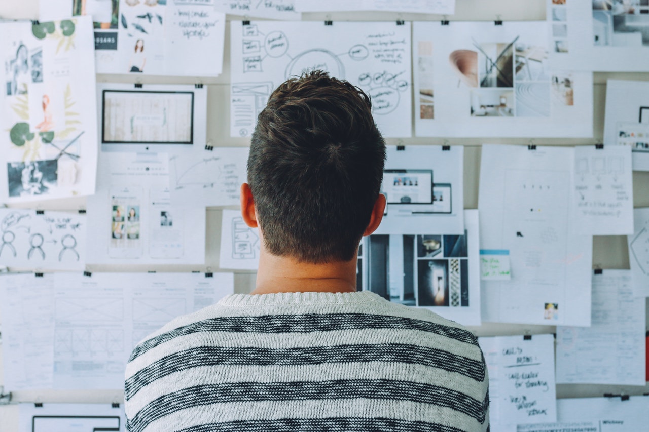 man deciding how to order hoarding graphics