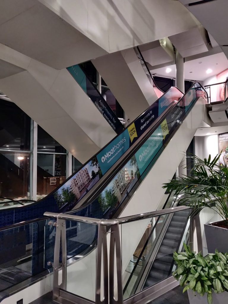 moat homes central escalator graphics